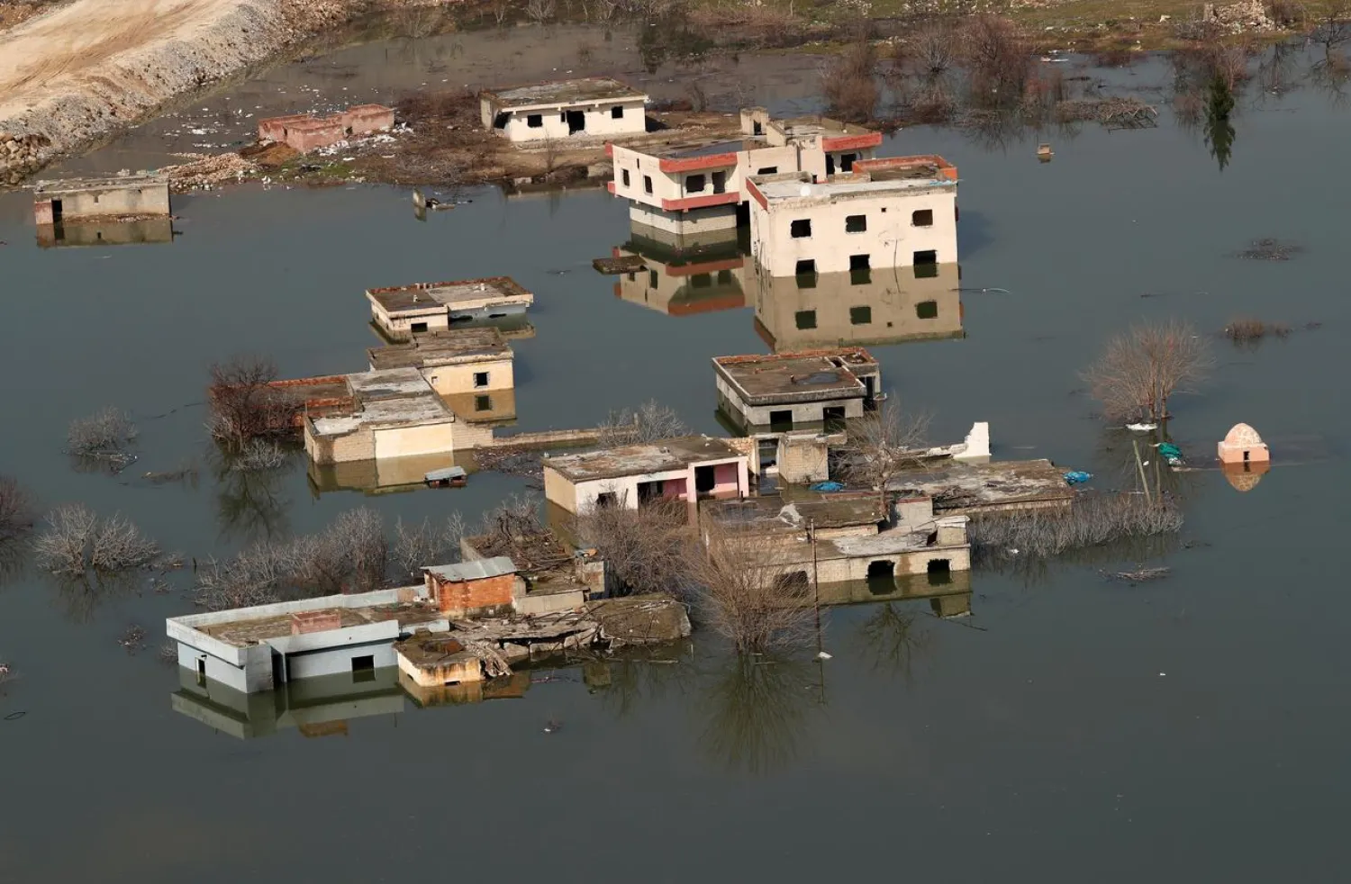 Houses submerged by the rising waters of the Tigris River are seen in Hasankeyf in southeastern Batman province, Turkey, February 20, 2020.. (Reuters)