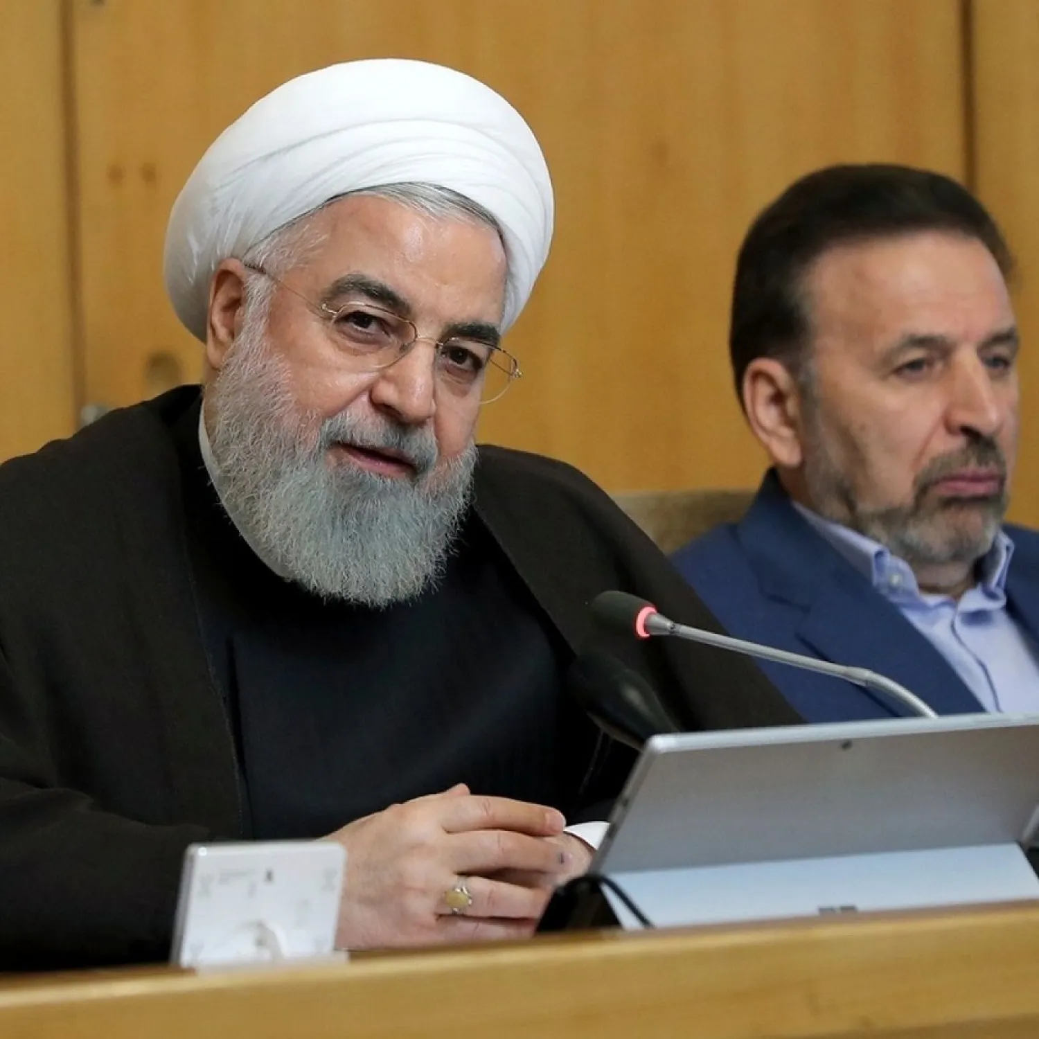Iran’s president, Hassan Rouhani, speaks during a cabinet meeting. To his left is his chief of staff, Mahmoud Vaezi. (AP)