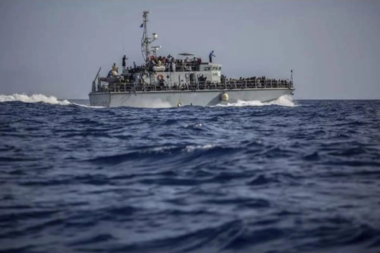 This June 24, 2018 file photo, released by the Libyan Coast Guard, shows migrants on a ship intercepted offshore near the town of Gohneima, east of the capital, Tripoli, Libya.