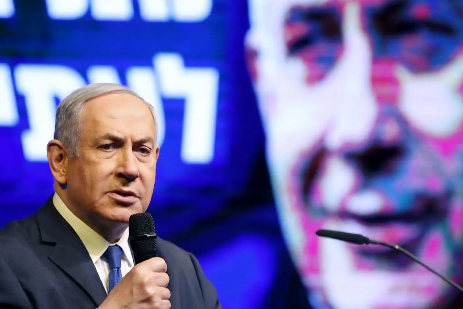 Israeli Prime Minister Benjamin Netanyahu said he would have 'four major immediate missions' if re-elected in polls on Monday | AFP