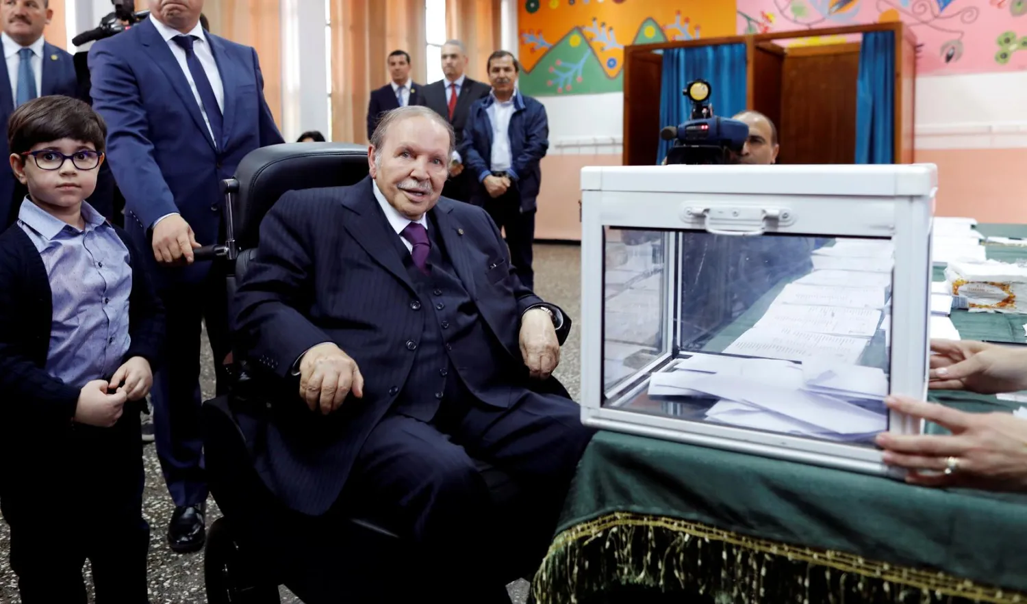 FILE PHOTO: Algeria's President Abdelaziz Bouteflika looks at journalists after casting his ballot during the parliamentary election in Algiers, Algeria, May 4, 2017. REUTERS/Zohra Bensemra/File Photo