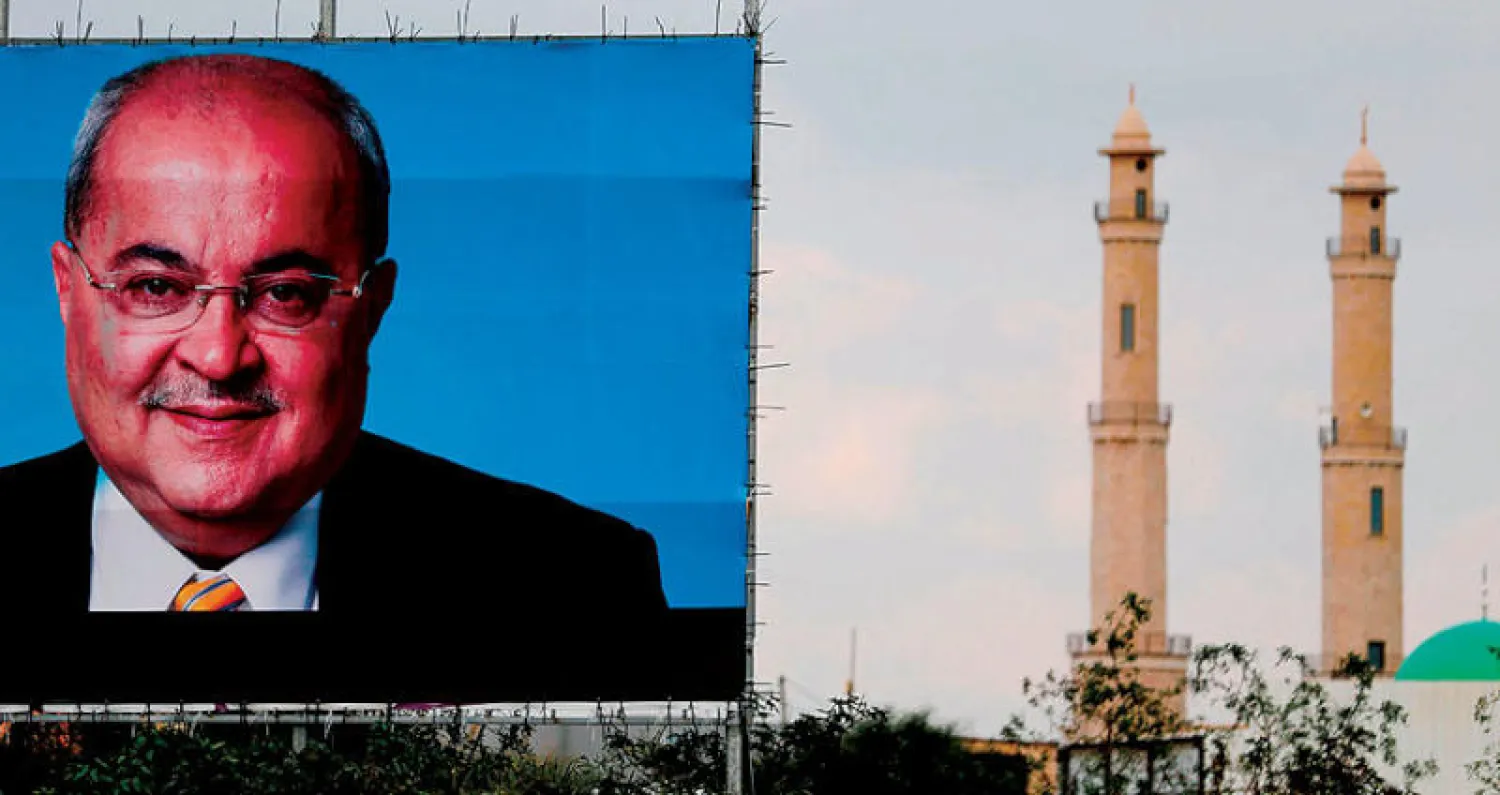 ملصق انتخابي في فبراير الماضي للنائب العربي في الكنيست أحمد الطيبي عضو «القائمة المشتركة» (إ.ف.ب)