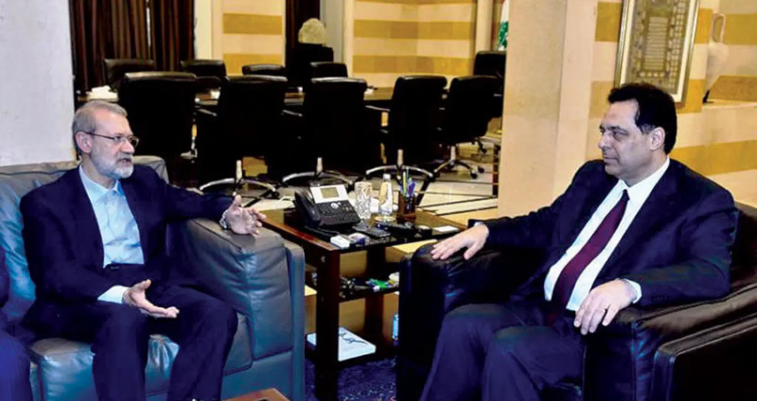 دياب مستقبلاً لاريجاني في فبراير الماضي (الوطنية)