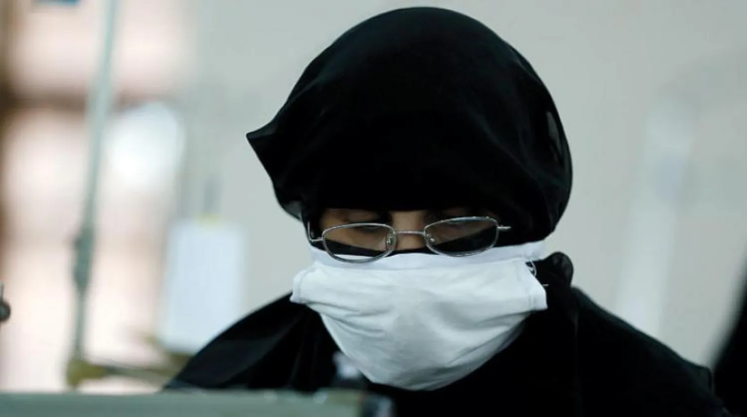 Worker at a masks weaving workshop in Sanaa (EPA)