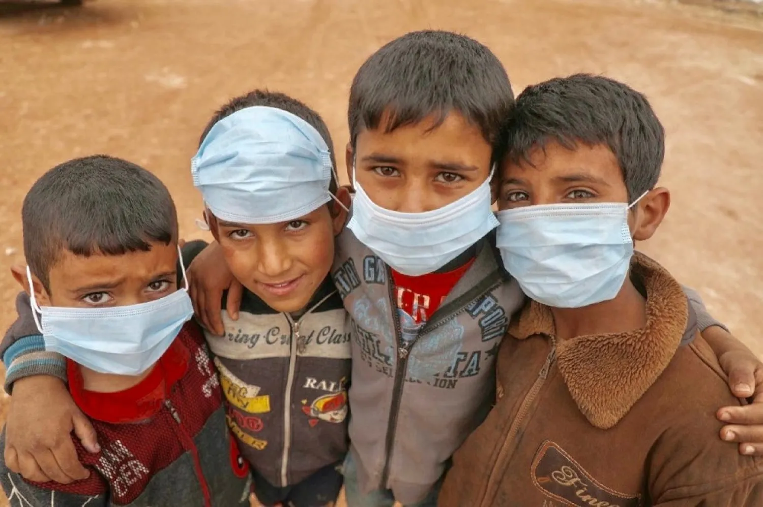 Syrian boys at coronavirus awareness workshop in a camp for displaced people in Syria's northwestern Idlib province. (AFP)