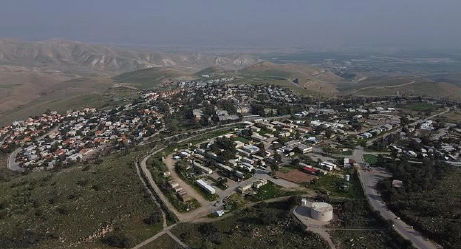 FILE - In this Tuesday, Feb. 18, 2020 photo, a view of the West Bank settlement of Ma'ale Efraim on the hills of the Jordan Valley. An Israeli watchdog group tells The Associated Press that Israel's settlement activity in the West Bank surged ahead in 2019, maintaining a rapid pace that has drawn strength from the friendly policies of the Trump administration. (AP Photo/Ariel Schalit)

