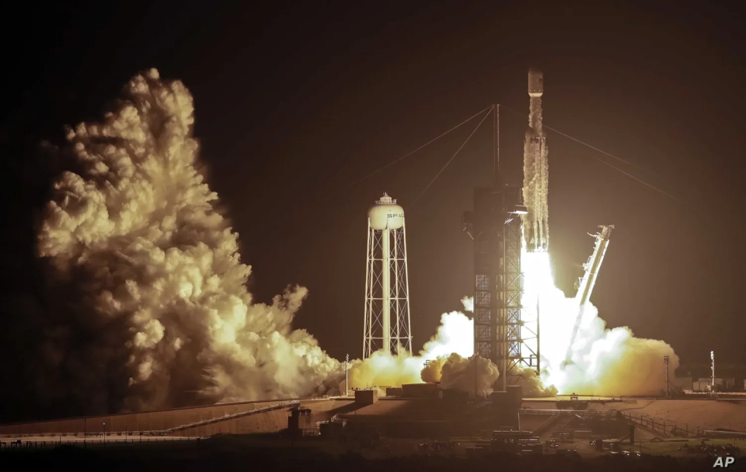 A SpaceX Falcon heavy rocket lifts off from pad 39A at the Kennedy Space Center in Cape Canaveral, Fla., June 25, 2019. AP