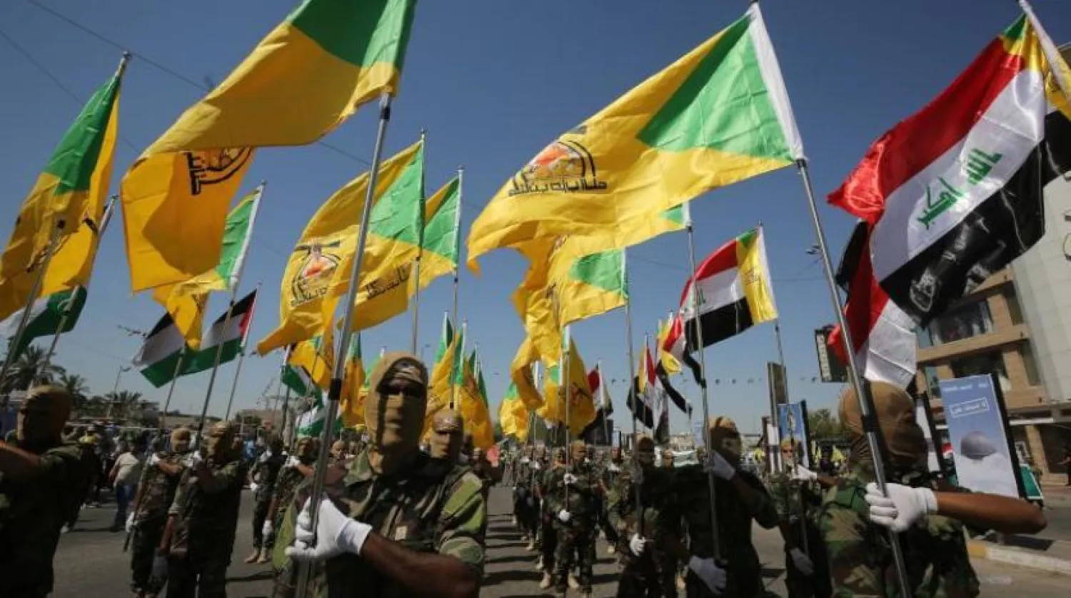 İran destekli Hizbullah Tugayları Bağdat’taki bir askeri geçit töreni sırasında (AFP-Arşiv)
