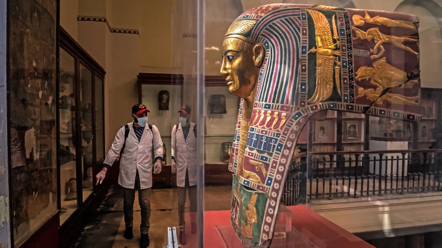 A worker disinfects a gallery at the Egyptian Museum in Cairo's Tahrir Square amid the coronavirus COVID-19 pandemic. (AFP)