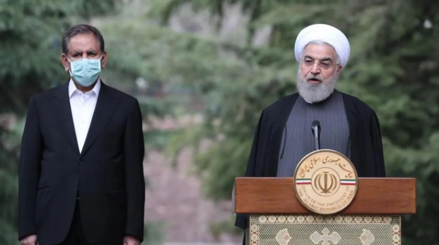 Iranian President Hassan Rouhani, to the right of his Vice President Ishaq Jahangiri | AFP Archive
