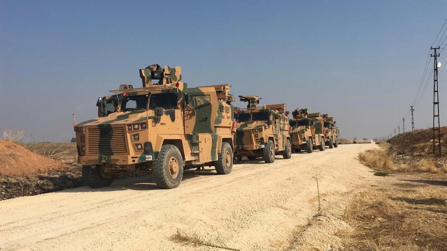 Turkish military vehicles are seen on the Turkish-Syrian border before a joint Turkish-Russian patrol in northeast Syria, near the Turkish town of Kiziltepe in Mardin province, Turkey, November 1, 2019. Turkish Defense Ministry/Handout via REUTERS
