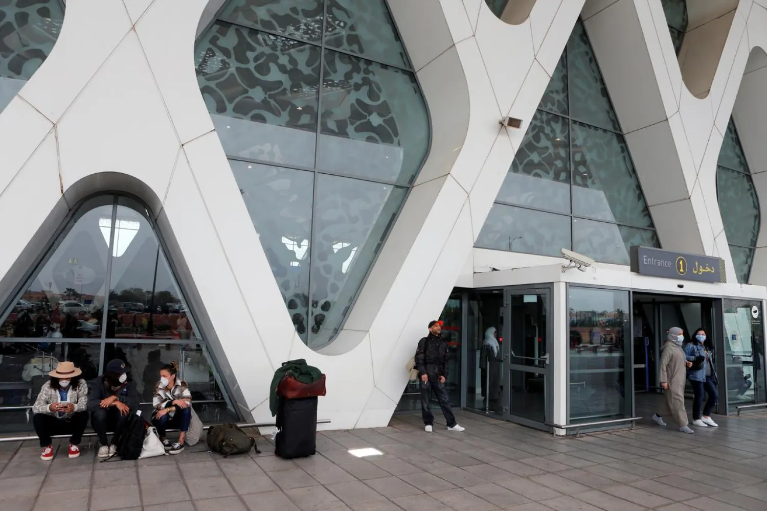Tourists wait to be repatriated to their countries as Morocco suspends flights to European countries over coronavirus disease (COVID-19) fears, at Marrakech airport, Morocco, March 15, 2020. REUTERS/Youssef Boudlal