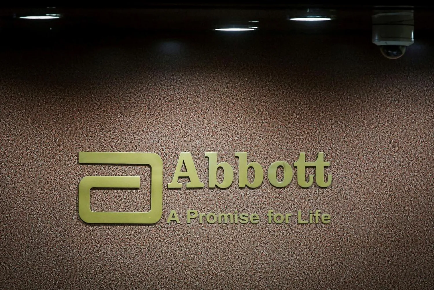 FILE PHOTO: An Abbott company logo is pictured at the reception of its office in Mumbai, India, September 8, 2015. REUTERS/Shailesh Andrade/File Photo