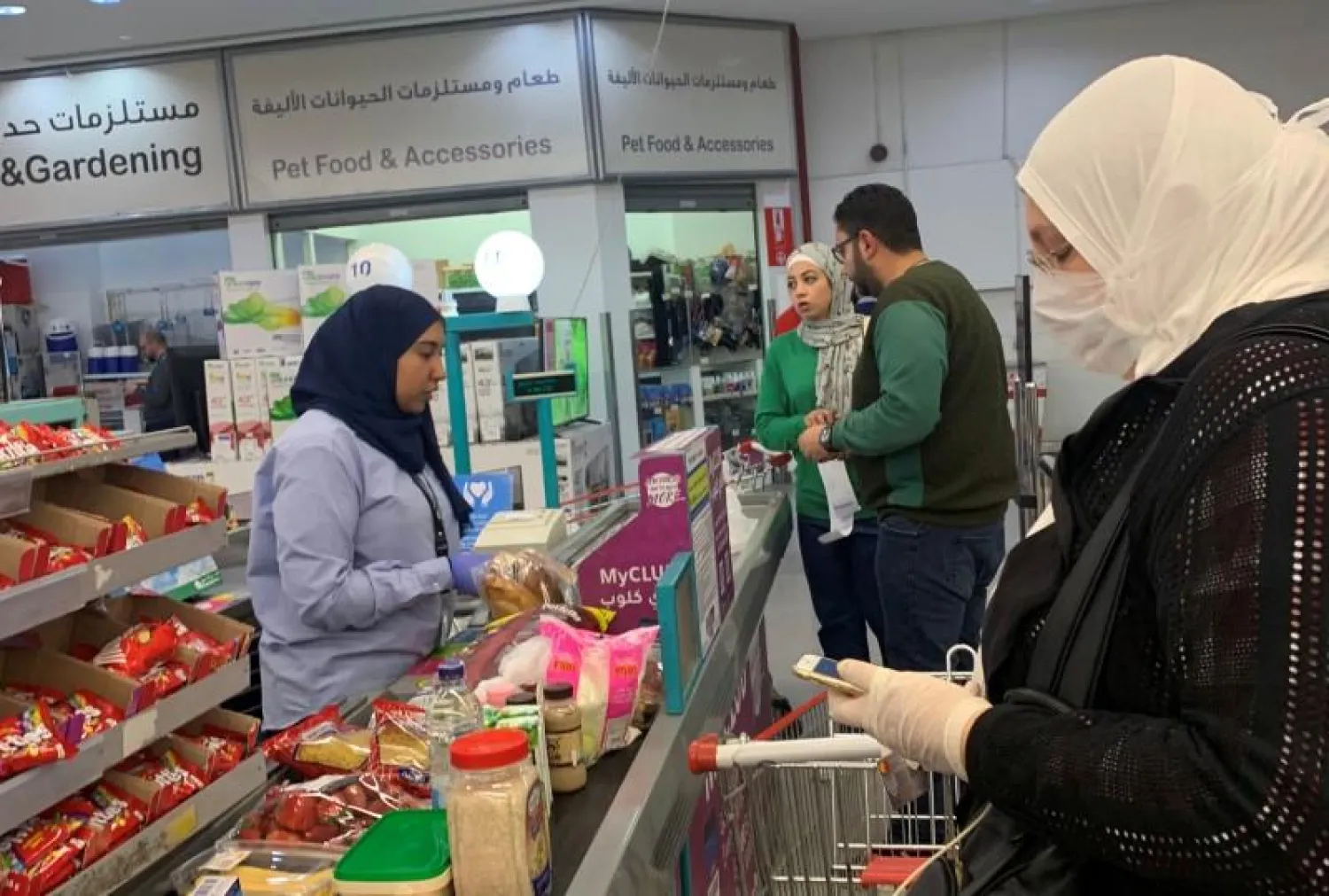 A woman wears a protective face mask inside a hypermarket in Cairo, Egypt (File photo: Reuters) 
