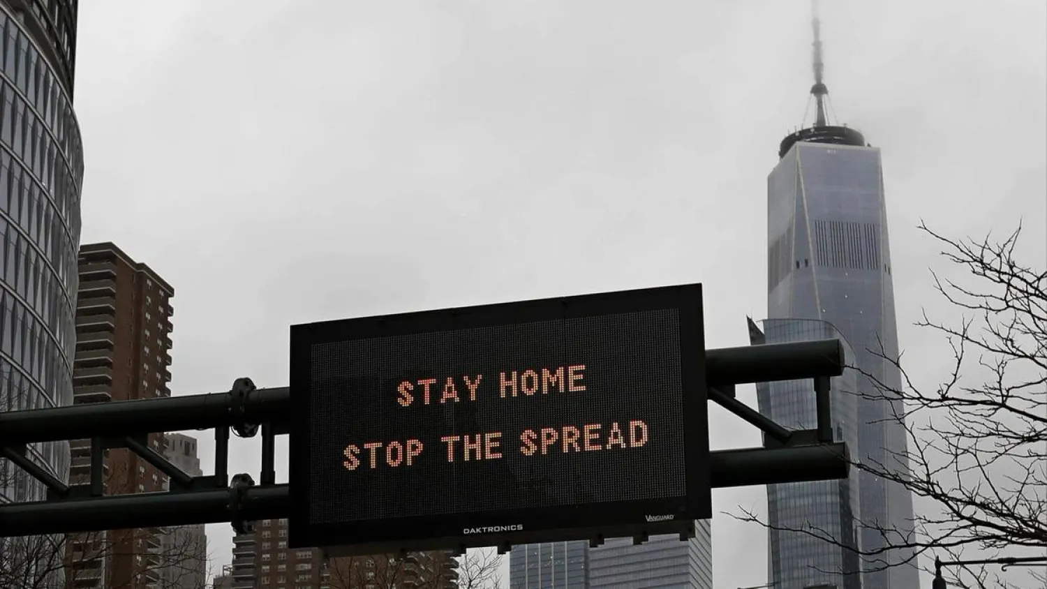 A traffic advisory sign on the West Side Highway instructs motorists to 'Stay Home Stop The Spread' in New York, New York, US. (EPA)