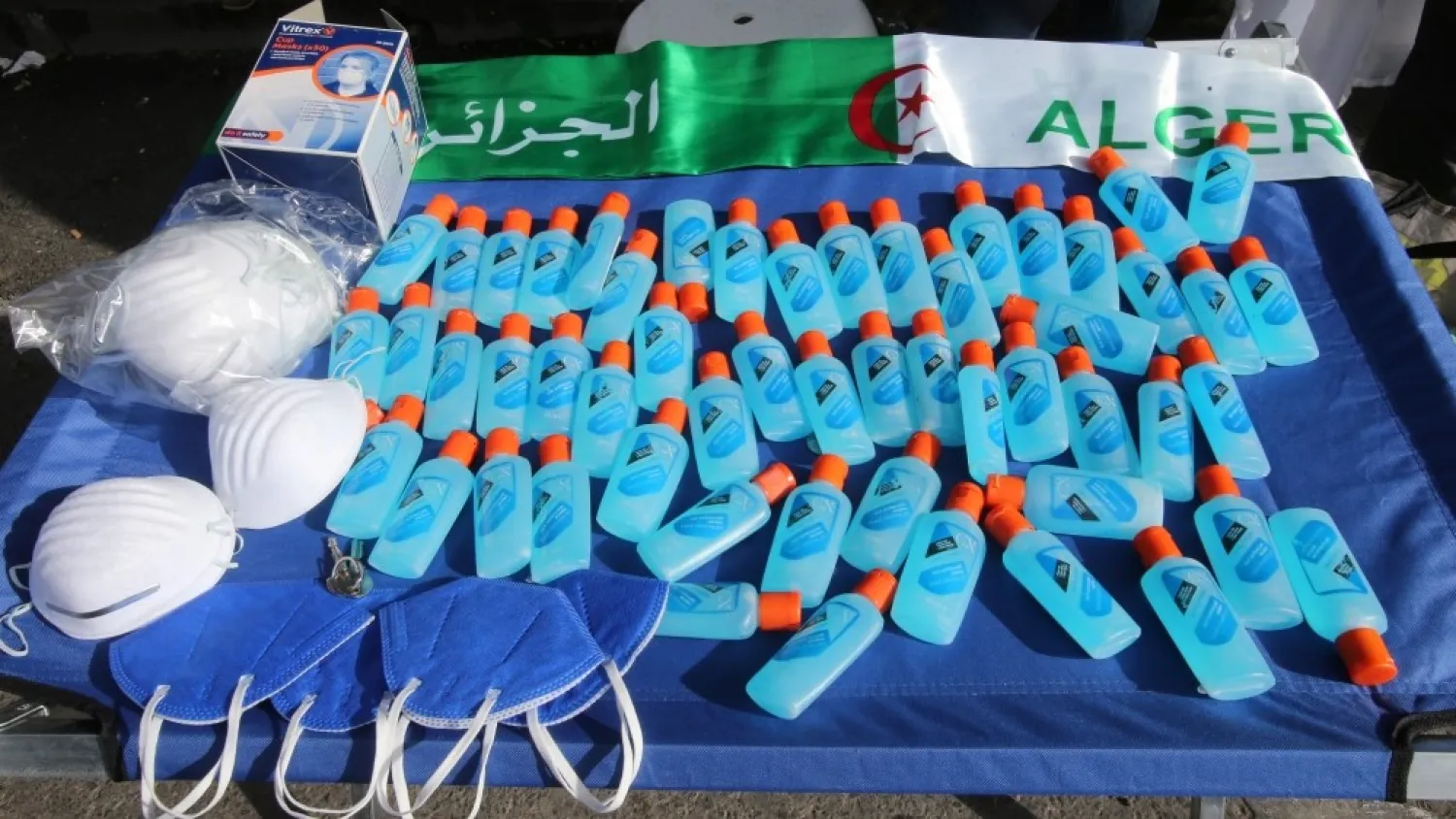 Protective face masks and hand cleaning gel are displayed for sale in Algiers (File photo: Reuters)
