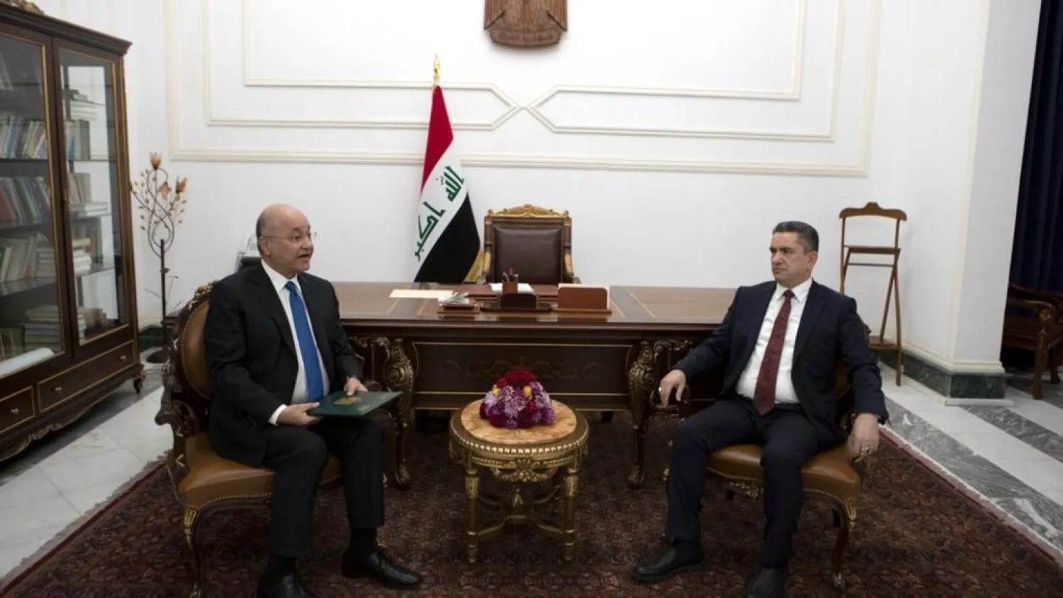 Iraq President Barham Salih, left, with Prime Minister-designate Adnan Al Zurufi at the commissioning ceremony on March 17, 2020. (Iraqi Presidency via Twitter)