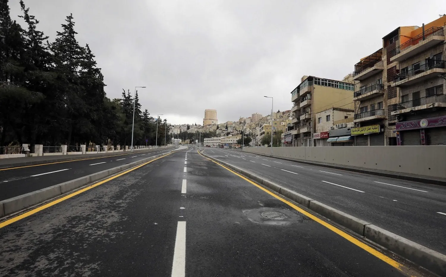 The streets of the Jordanian capital are seen empty after the start of a nationwide curfew, amid concerns over the coronavirus spread, in Amman, Jordan, March 21, 2020. (Reuters)