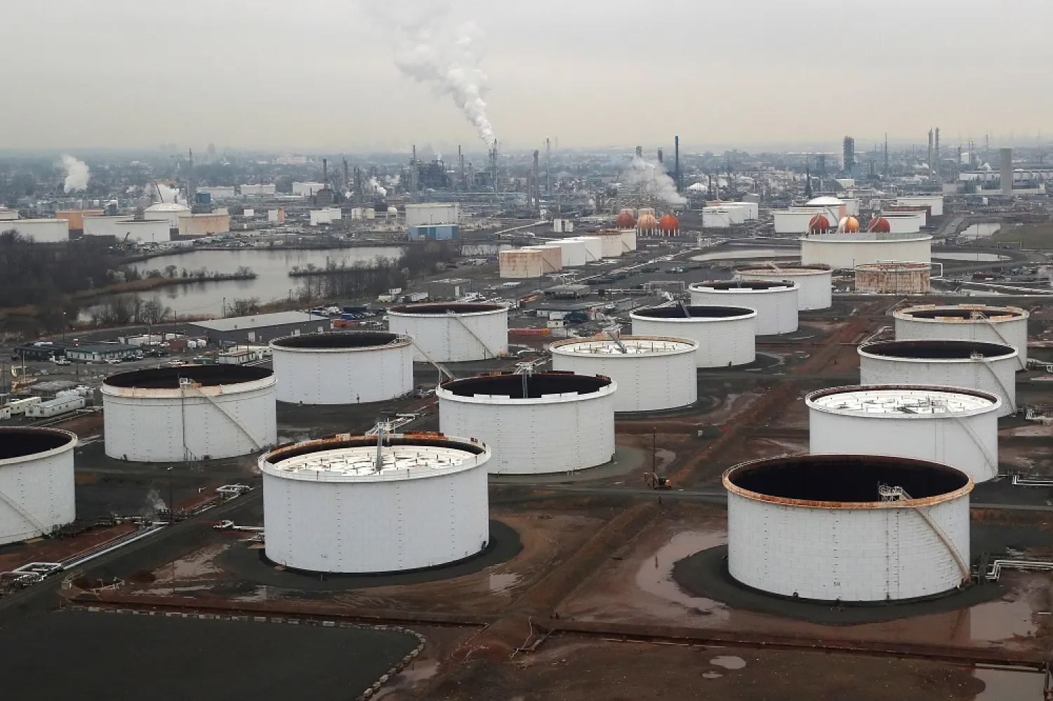 General view of oil tanks and the Bayway Refinery of Phillips 66 in Linden, New Jersey, US, March 30, 2020. (Reuters)