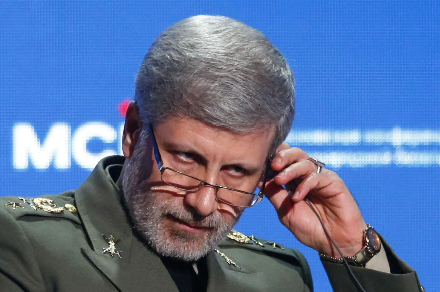 FILE PHOTO: Iranian Defense Minister Amir Hatami adjusts a headphone during the annual Moscow Conference on International Security (MCIS) in Moscow, Russia April 4, 2018. REUTERS/Sergei Karpukhin