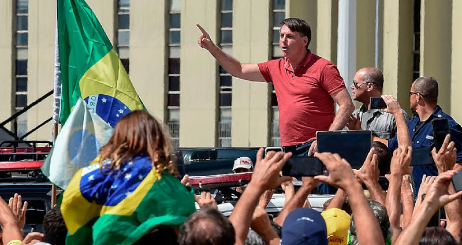 جايير بولسونارو يخاطب أنصاره في برازيليا أمس (أ.ف.ب)