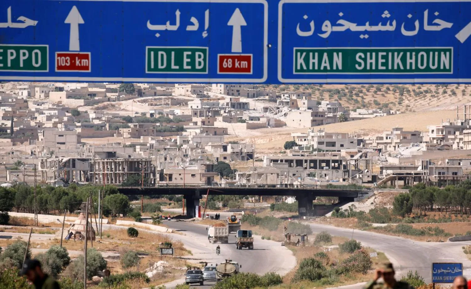 Caption: FILE PHOTO: Road direction signs are pictured at the entrance en route to Khan Sheikhoun, Idlib, Syria August 24, 2019. REUTERS/Omar Sanadiki