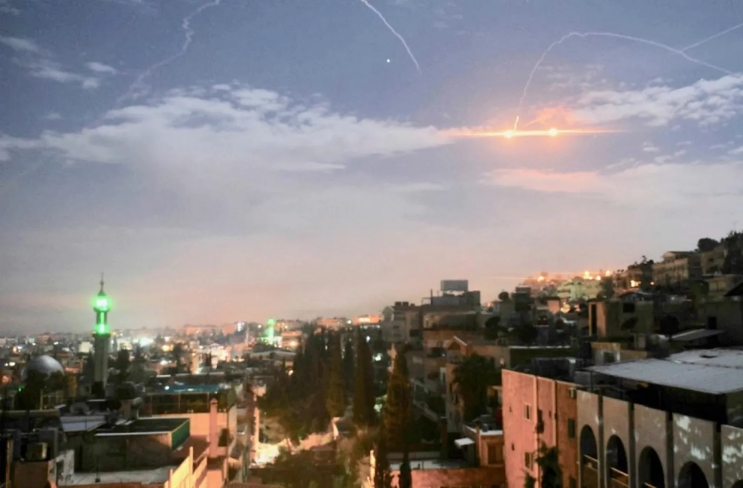 A file photo shows Syrian air defense batteries responding to what the Syrian state media said were Israeli missiles targeting Iranian targets. (AFP) 