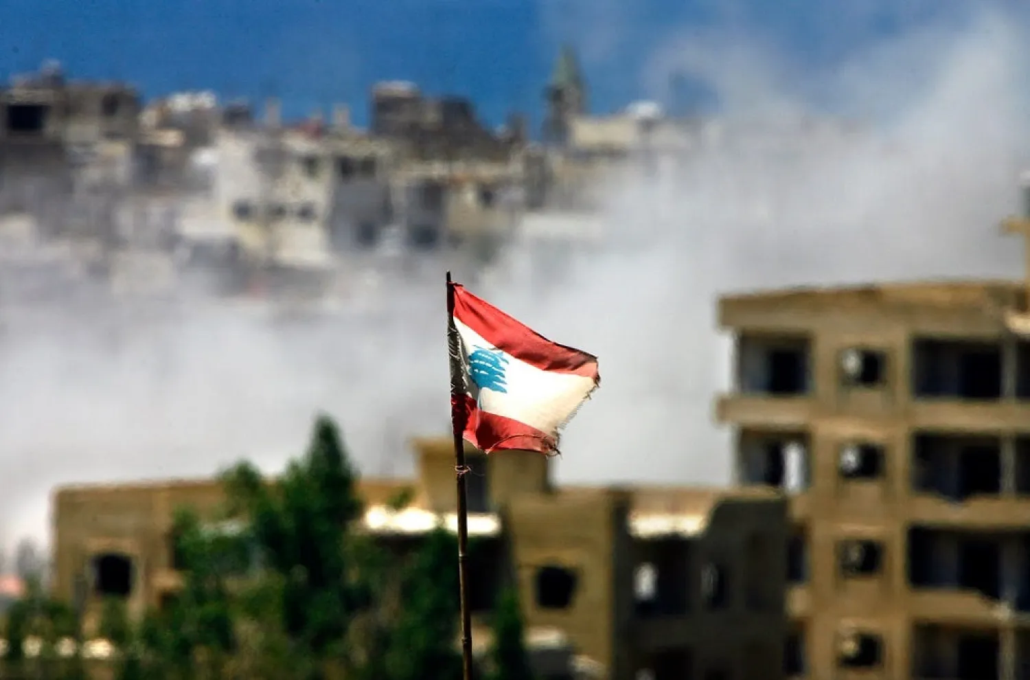 A Lebanese flag flies outside of the northern city of Tripoli. (Reuters)