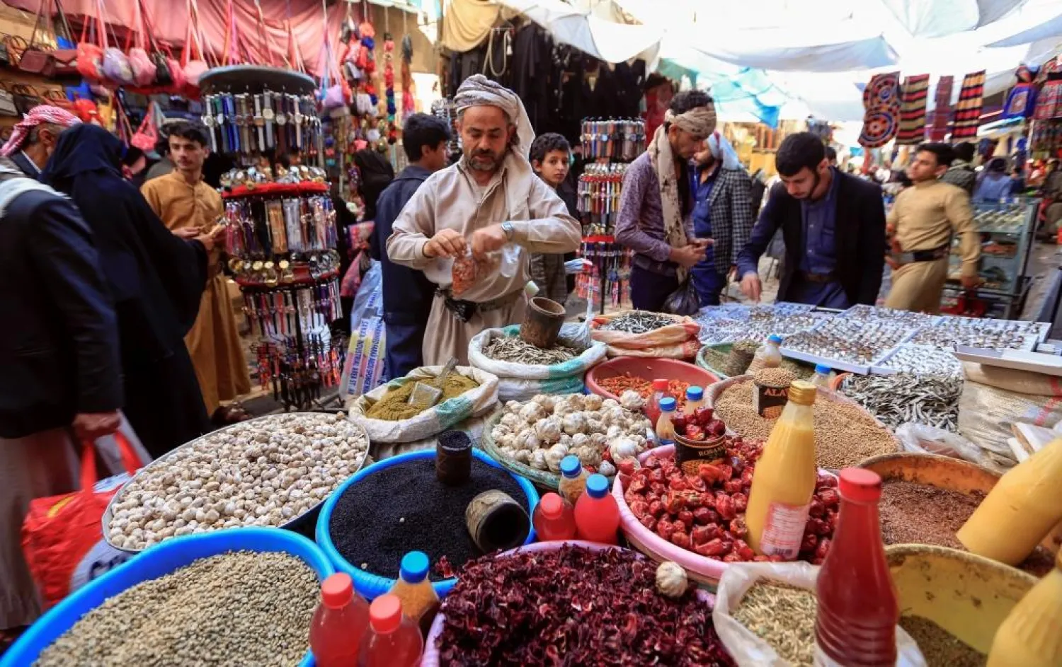 Yemeni shop at a market in Sanaa. (AFP)