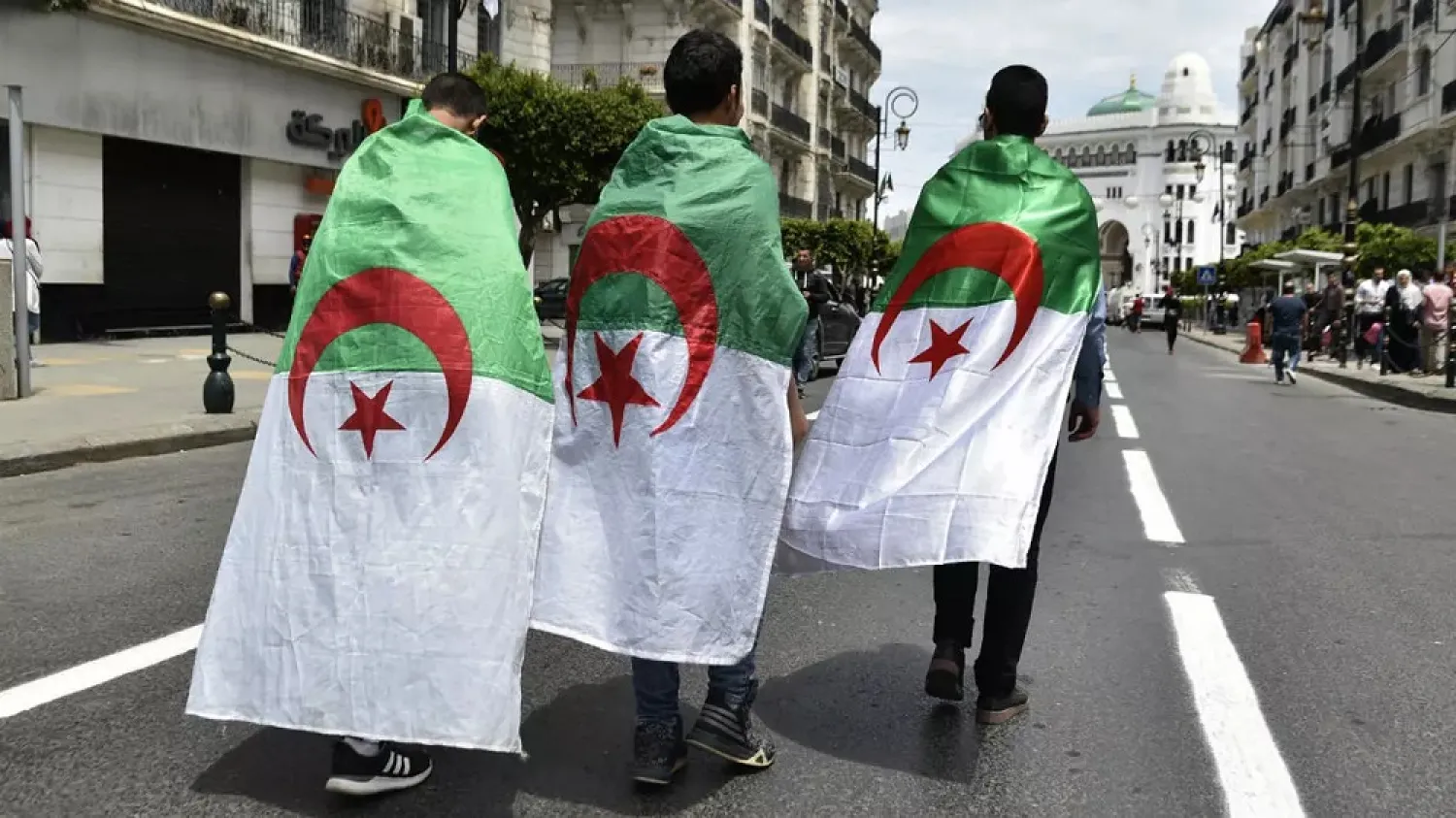 Algerian students take part in a demonstration to mark the 63rd anniversary of National Student Day in the capital Algiers on May 19, 2019. (AFP)