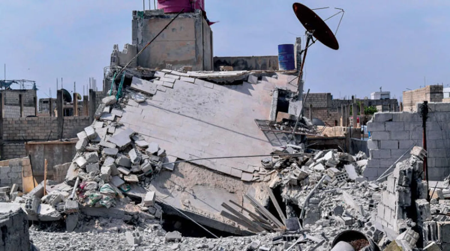 صورة وزعتها وكالة الأنباء السورية الرسمية (سانا) لمنزل في ريف دمشق دُمّر جراء القصف الإسرائيلي أمس (أ.ب)