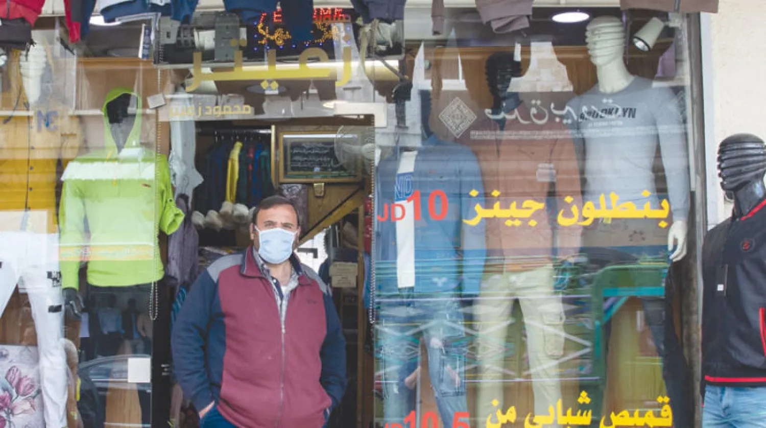 محلات وسط العاصمة الأردنية تفتح أبوابها تدريجياً (إ.ب.أ)