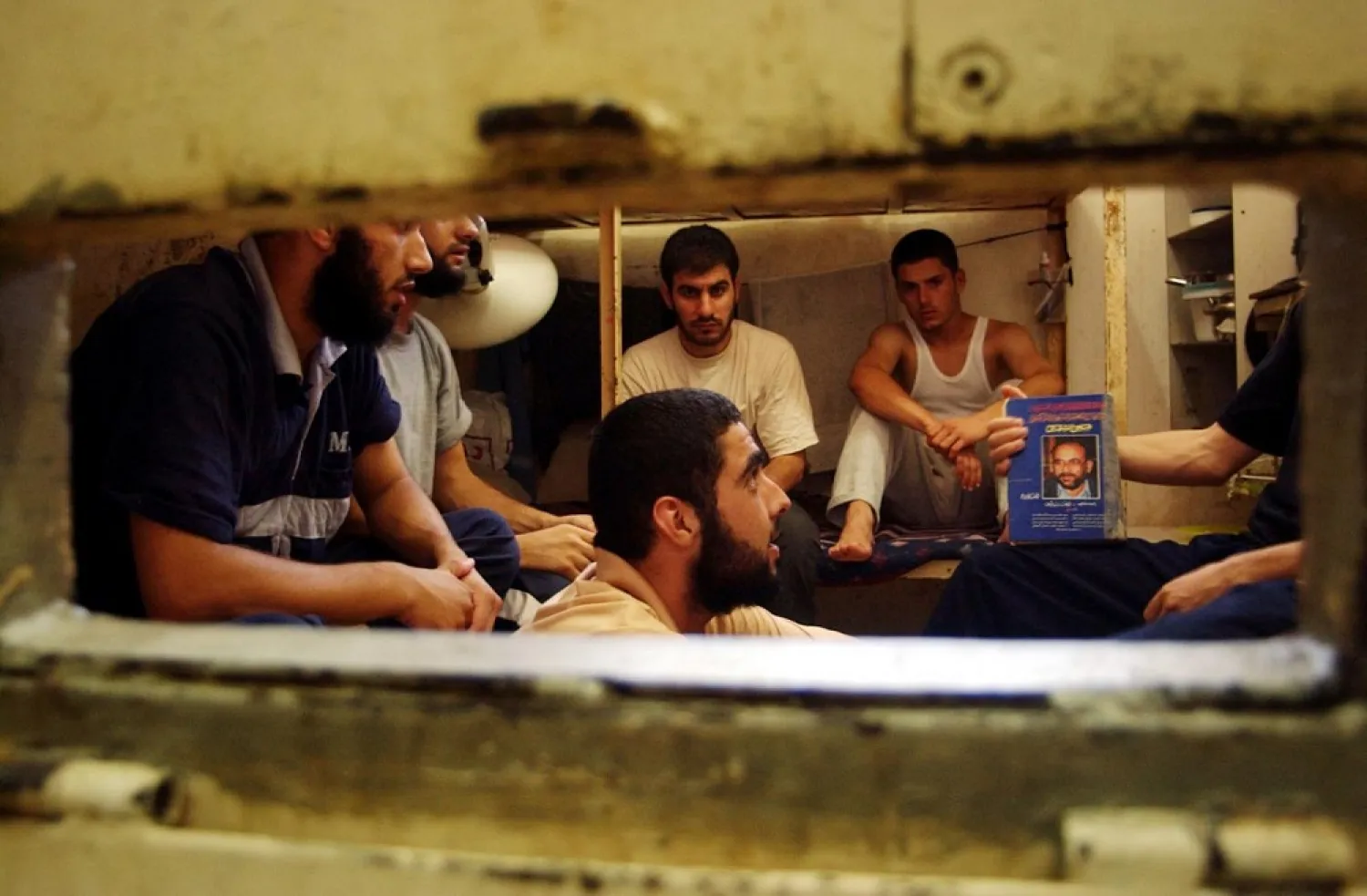 Palestinian prisoners sit in a prison cell in Ashkelon. (Reuters file photo)