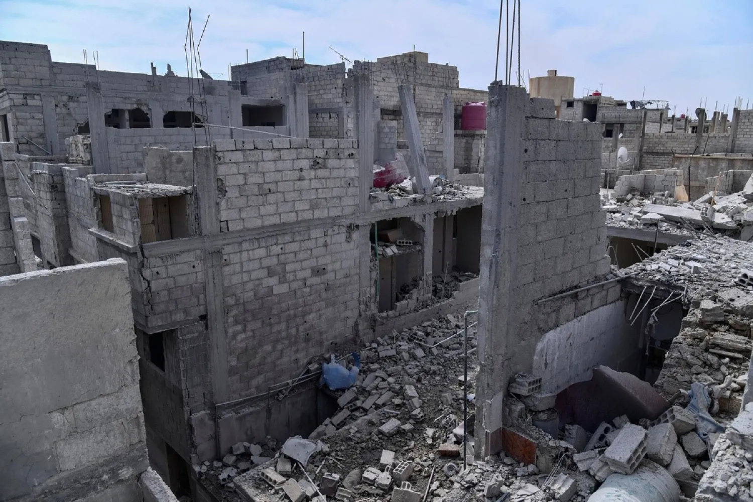 A general view shows a damaged building in the western Damascus suburbs, Syria in this handout released by SANA on April 27, 2020. [Photo/Agencies]