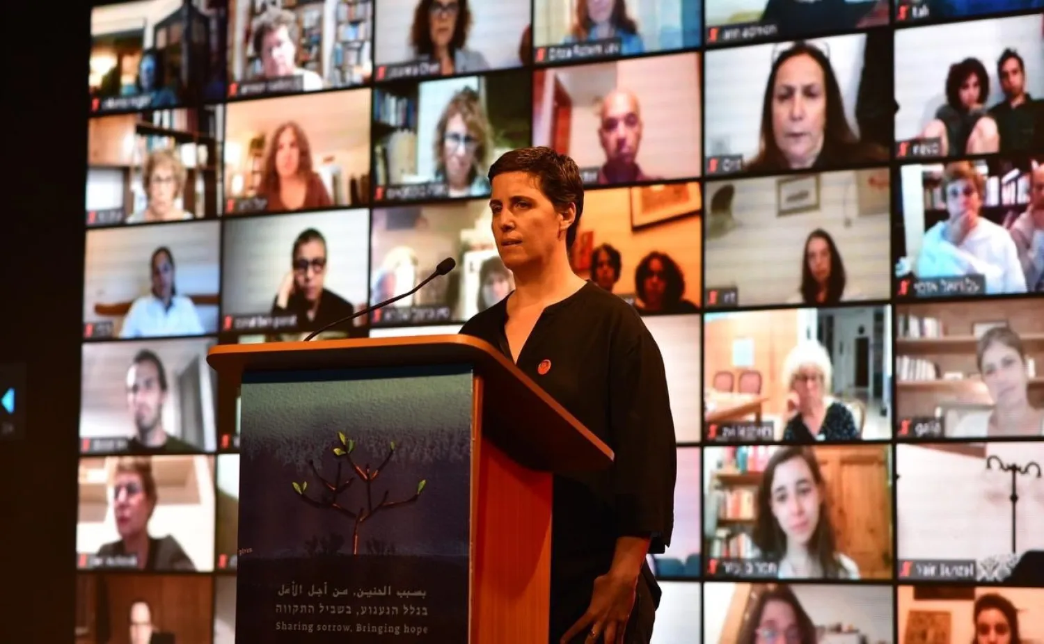 Bereaved Israeli family member, Tal Kfir, speaks during the joint Israeli-Palestinian Memorial Day ceremony broadcast from Tel Aviv on Monday evening, April 27. (Photo: Combatants for Peace)