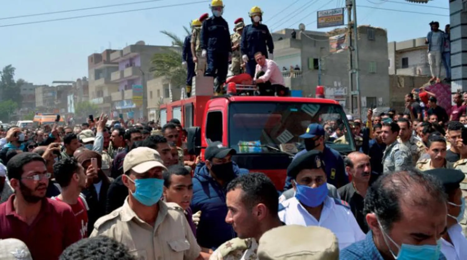 Mourners carry the coffin of Alaa Emad during the funeral of Alaa Emad in the Ebwan village, al-Minya Governorate, Egypt, 01 May 2020. EPA/MOHAMED HAKIM