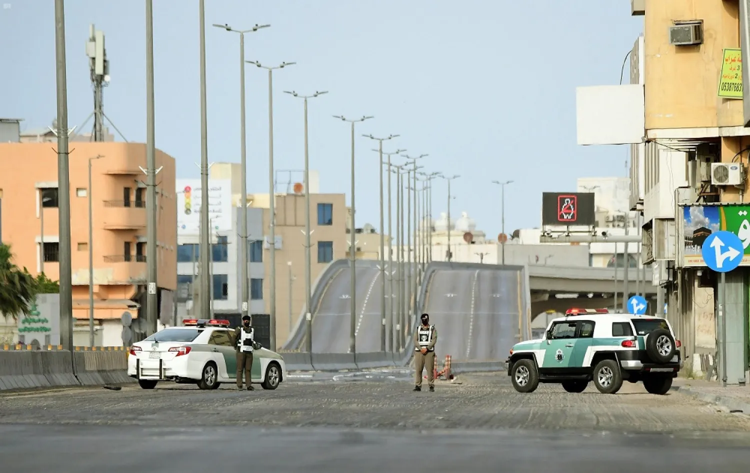 Security forces man a checkpoint during curfew in Saudi Arabia. (SPA)
