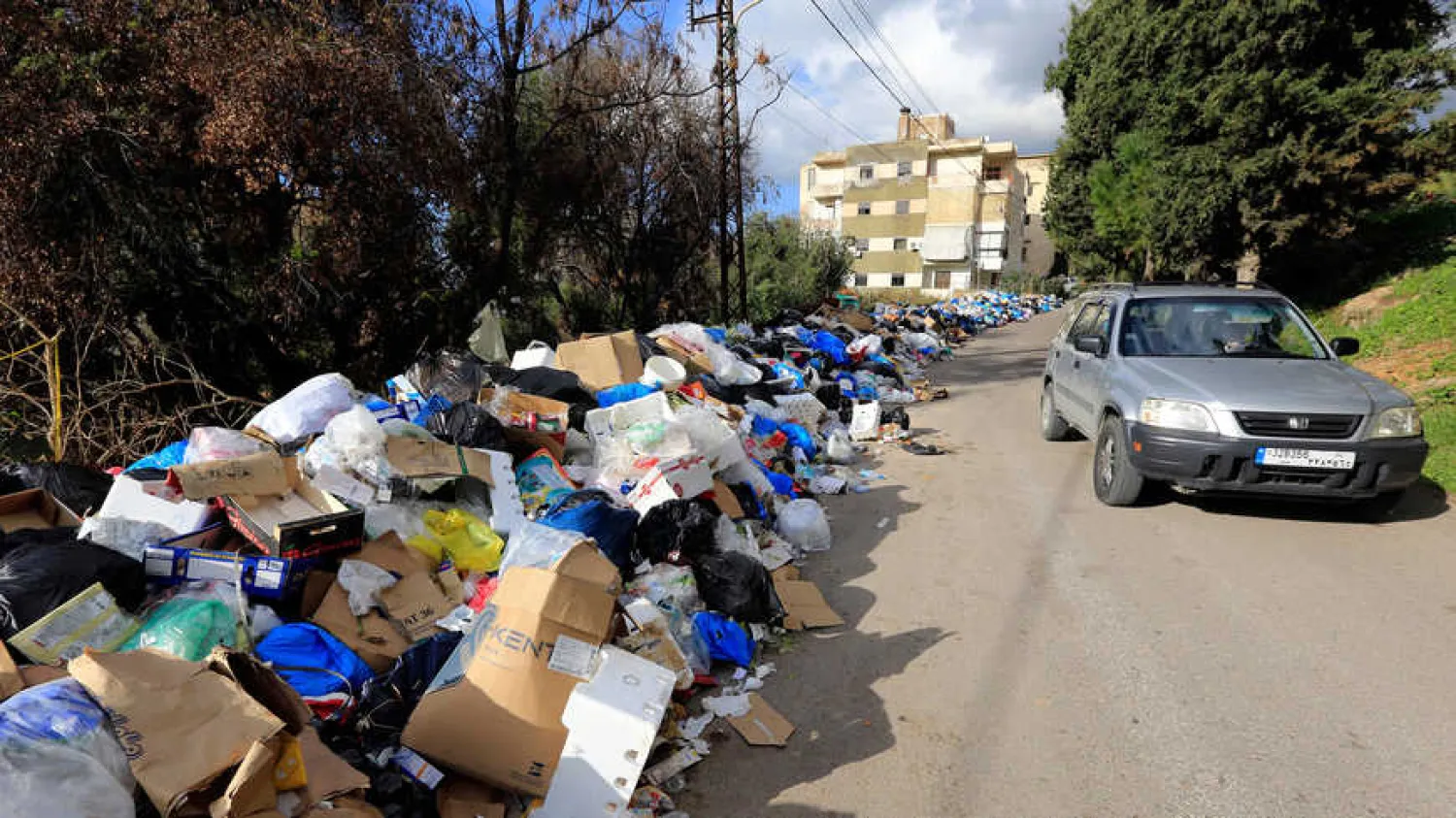 Rubbish bags piled up on the side of the road, Hazmieh, Lebanon, July 25, 2017. Photo by Ratib Al Safadi/Anadolu Agency
