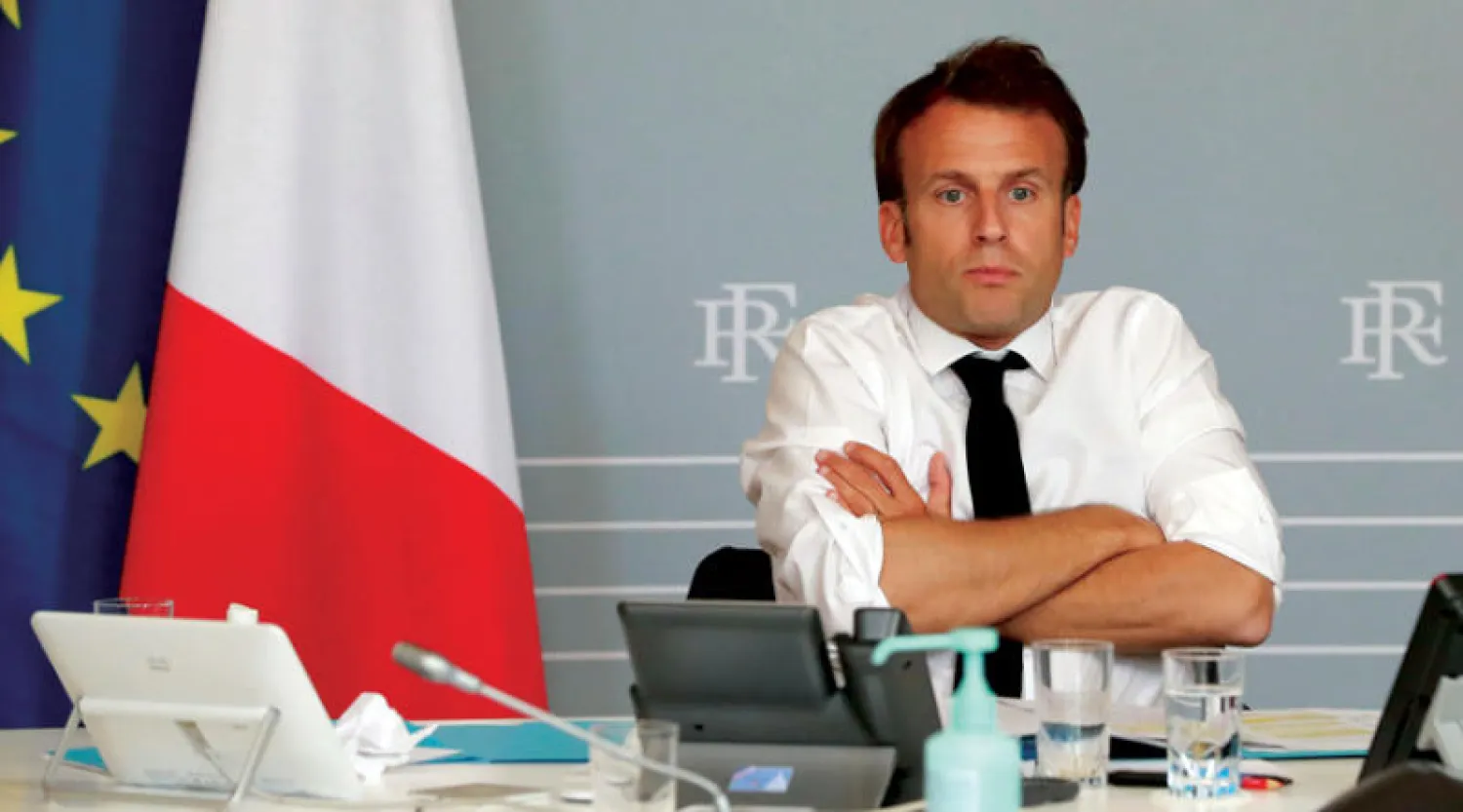 ماكرون مكتوف اليدين أمام تداعيات فيروس {كورونا} (أ.ب)