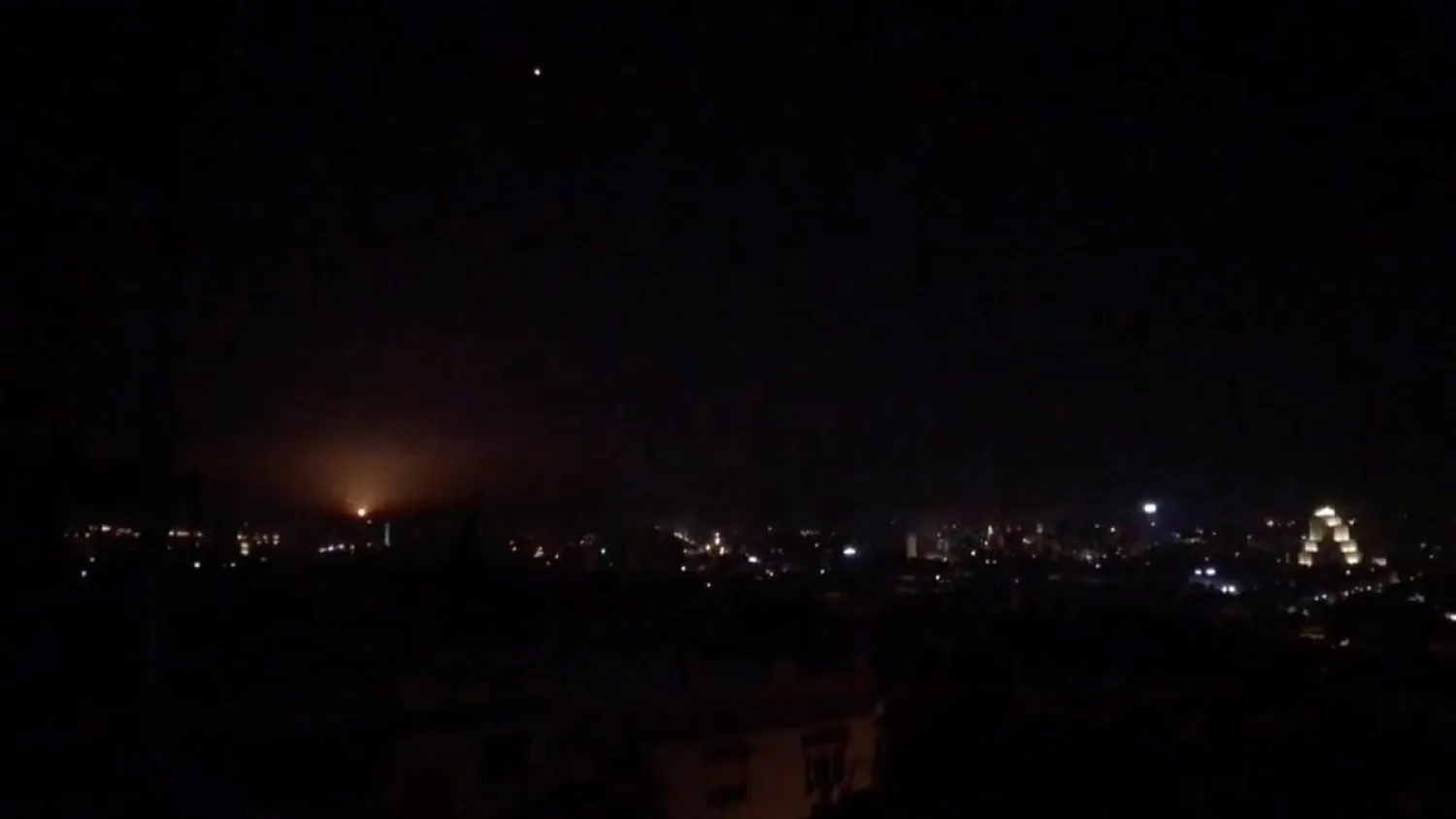 What is believed to be guided missiles are seen in the sky during an attack in Damascus, Syria, January 21, 2019, in this still image taken from a video obtained from social media. Facebook Diary of a Mortar Shell in Damascus/Youmiyat Qadifat Hawun fi Damashq/via REUTERS