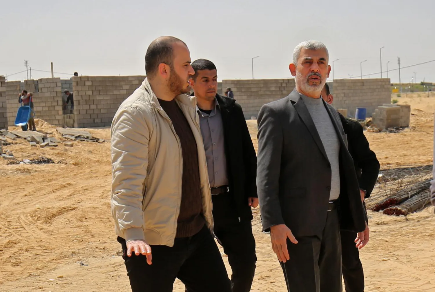 Hamas' Yahya Sinwar visits the construction site of a field hospital to house coronavirus patients in Rafah, southern Gaza Strip, on 23 March 2020 (AFP)