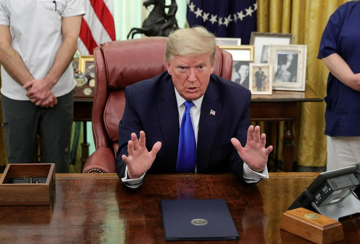 US President Donald Trump speaks before signing a proclamation in honor of National Nurses Day in the Oval Office at the White House in Washington, US, May 6, 2020. REUTERS/Tom Brenner