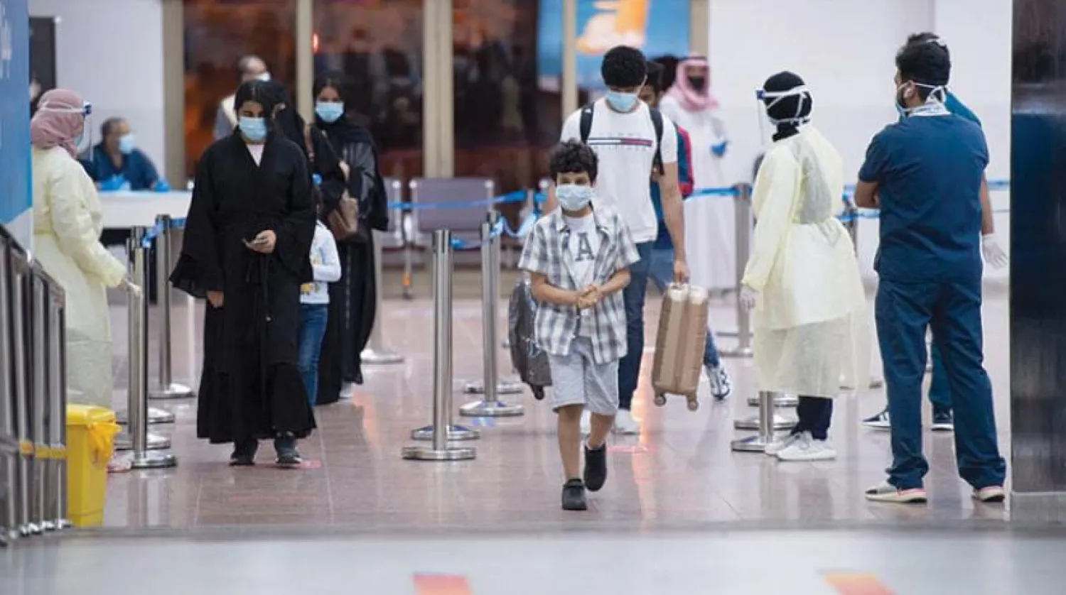 Ülkeye dönüş yapan vatandaşlar dönüşlerini kolaylaştığı için hükümete minnetlerini dile getirdi (WAM)