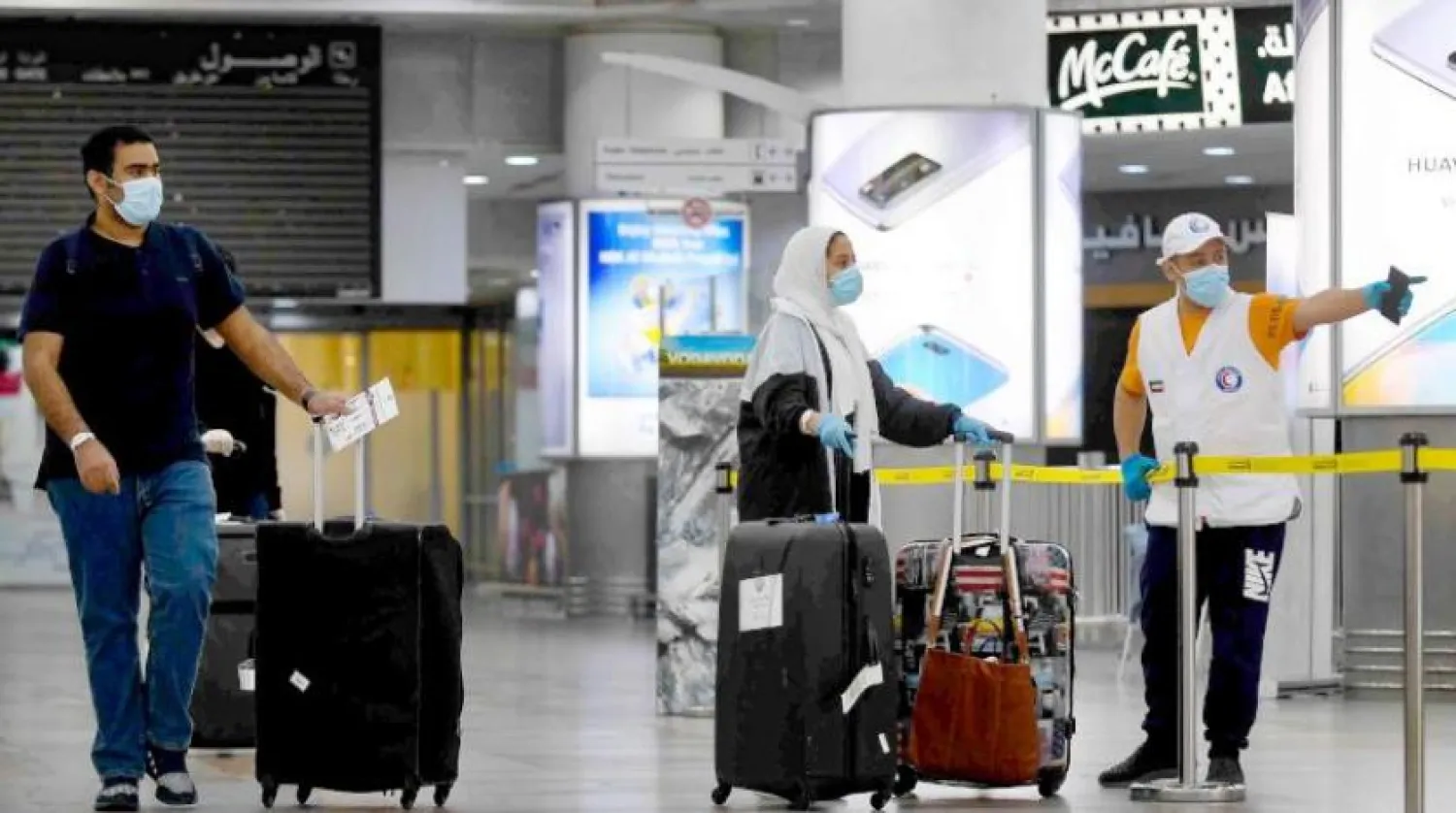 Yurtdışından dönen Kuveyt vatandaşları (AFP)