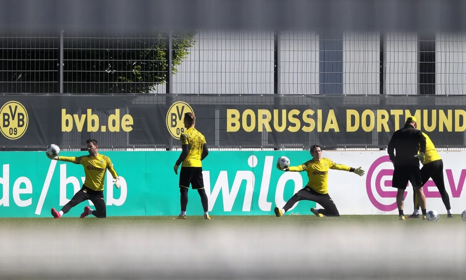 Dortmund goalkeepers Roman Bürki and Marwin Hitz are pictured in training before the first game back, against local rivals Schalke. (EPA)