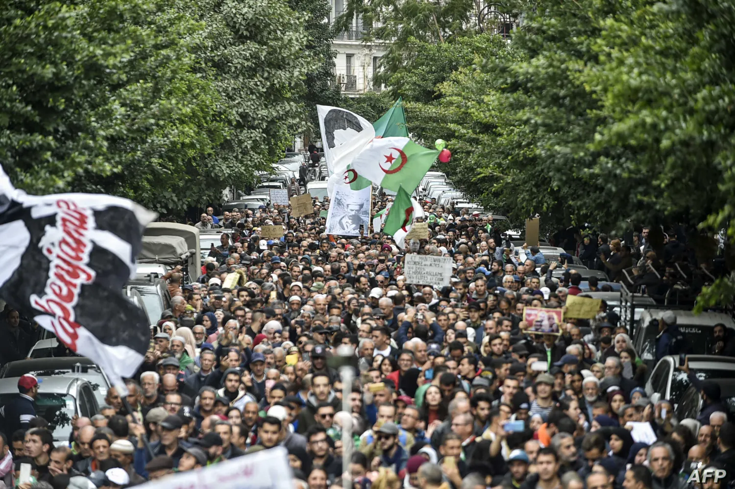 People gathering during a mass anti-government protests in Algiers (File photo: AFP)
