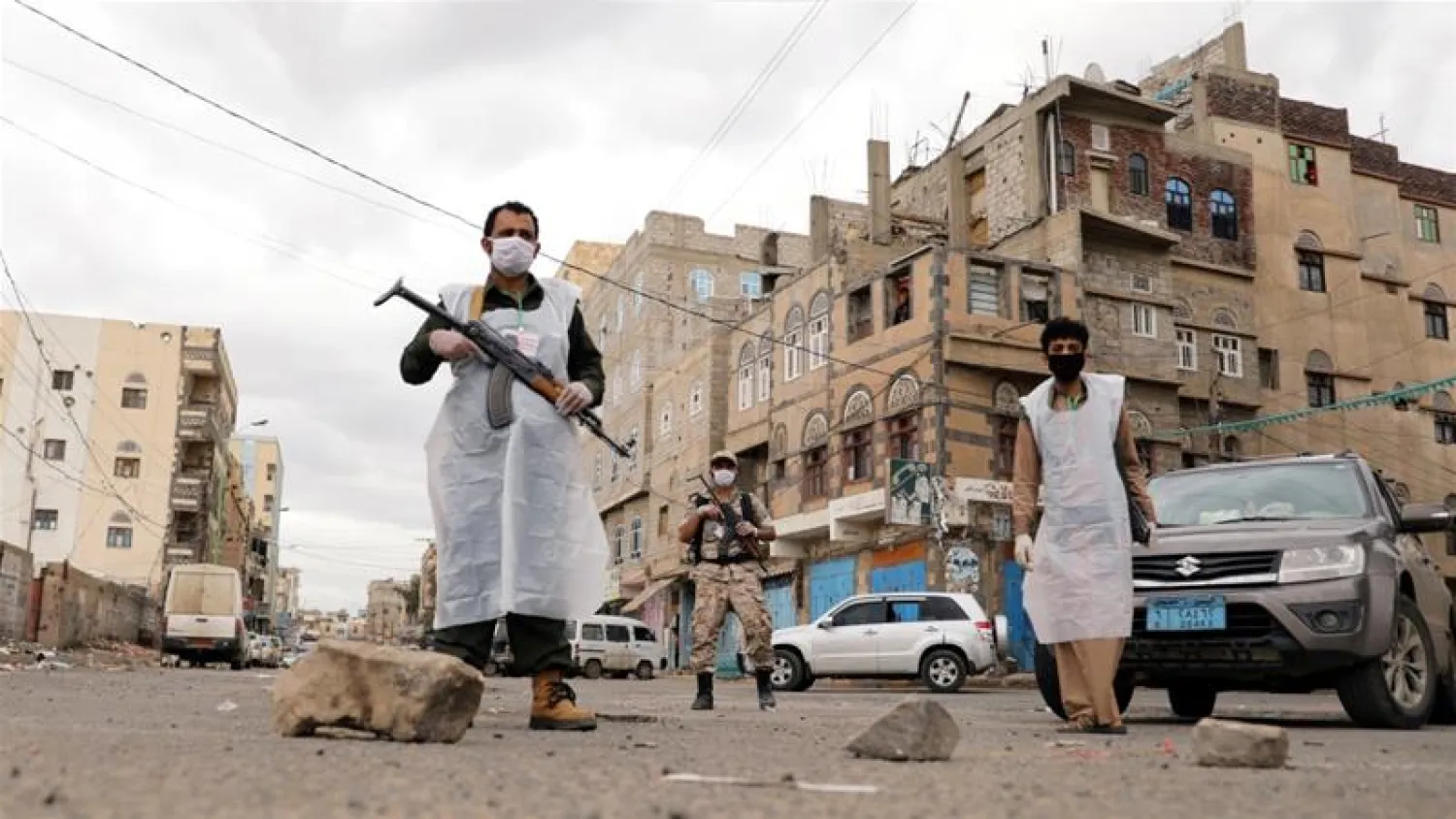 Houthi fighters wearing masks | Khaled Abdullah/Reuters