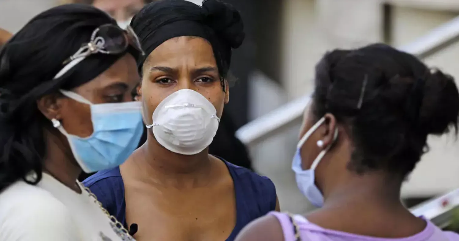 Ethiopian domestic workers wait outside their country's consulate to register for repatriation, in the Hazmieh suburb of the Lebanese capital Beirut on May 18, 2020. (Photo by JOSEPH EID / AFP)