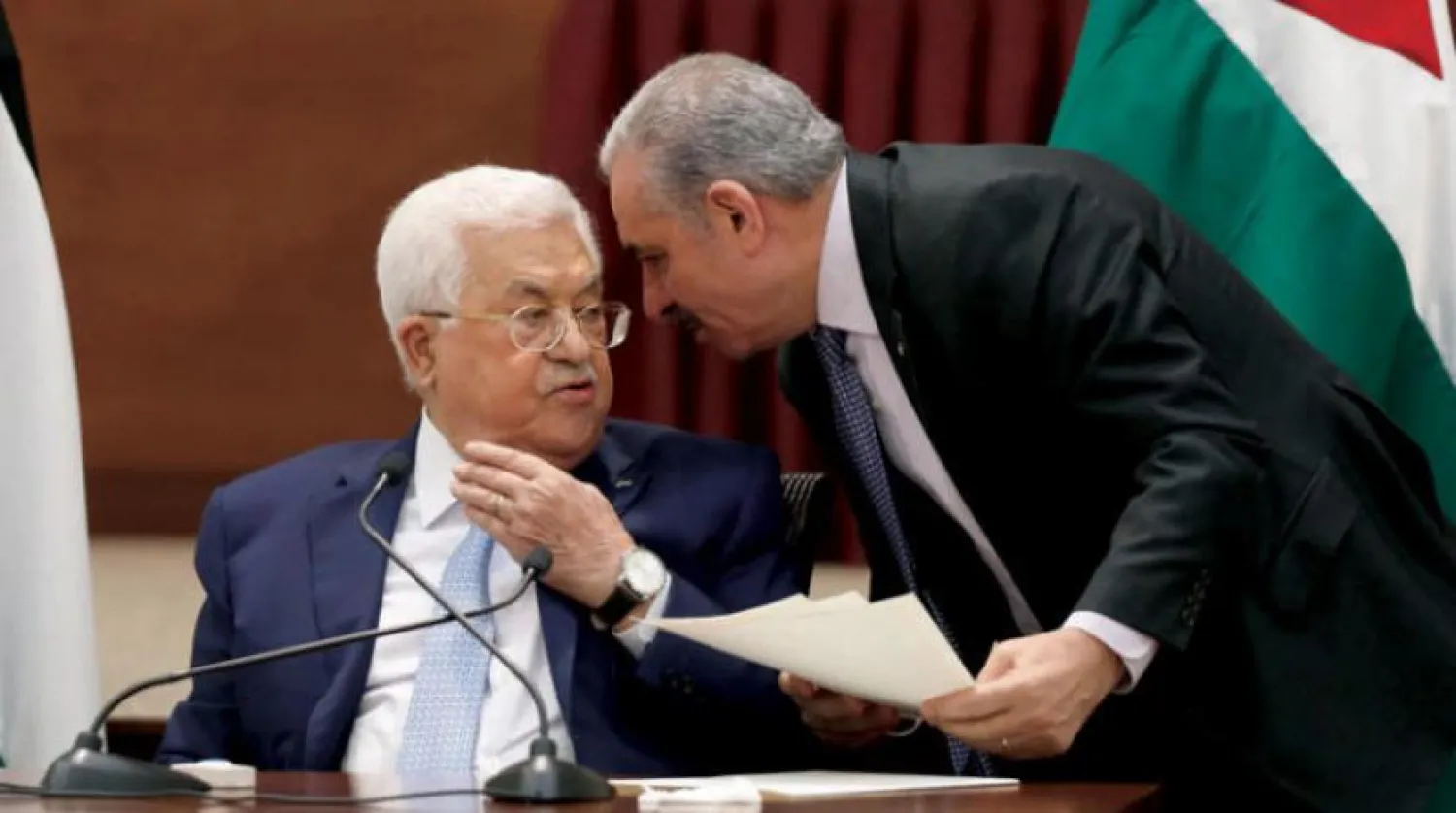 Abbas ve Iştiyye, Filistinli liderlerin geçen salı günü düzenlediği toplantıda bir araya geldiler. (AFP)