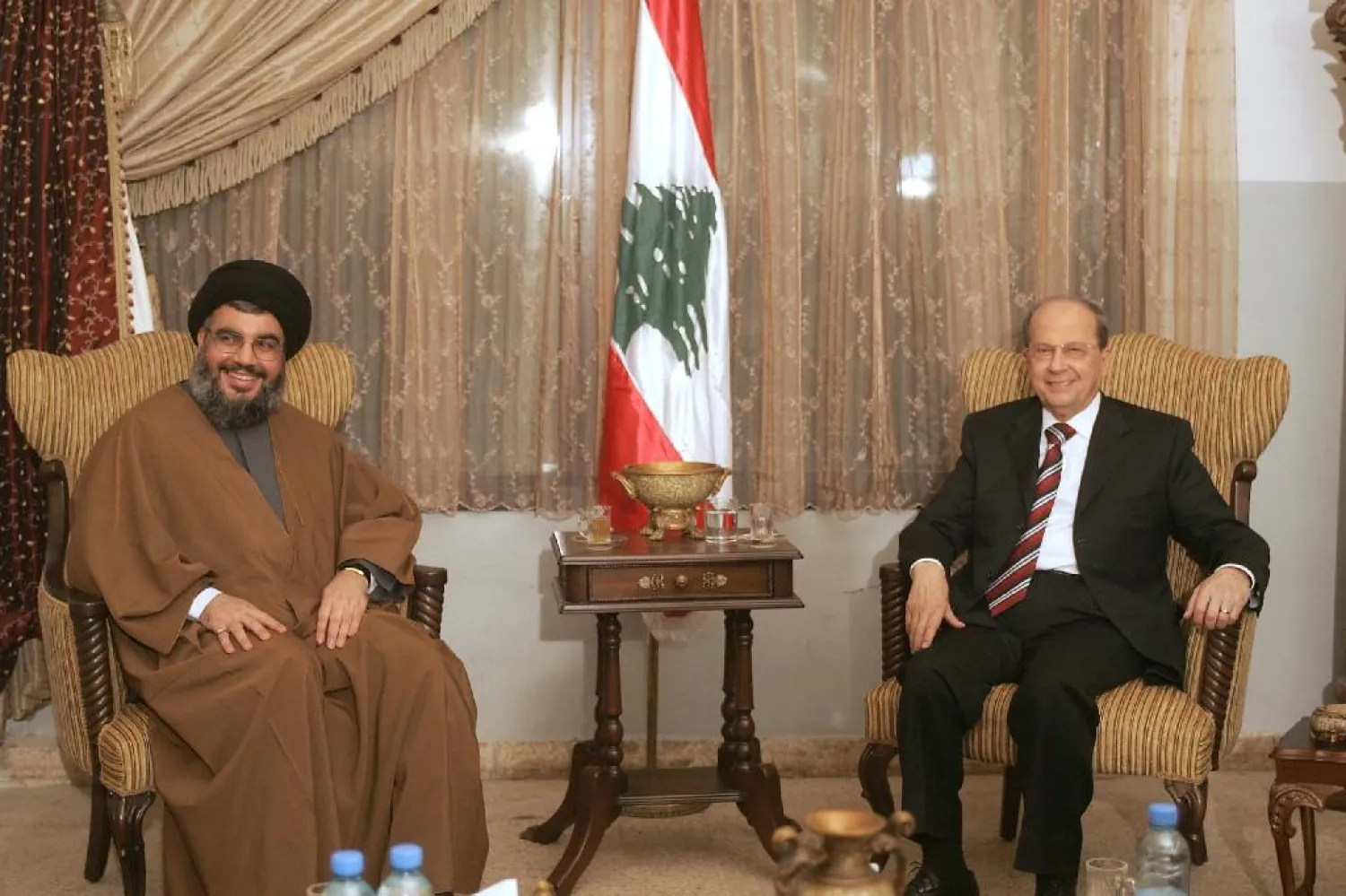 Hezbollah Secretary General Hassan Nasrallah during his first meeting with General Michel Aoun in 2006. (AFP)